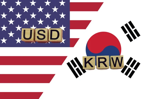 American and South Korea Republic currencies codes on national flags background. USD and KRW currencies