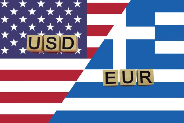 American and Greek currencies codes on national flags background. USD and EUR currencies