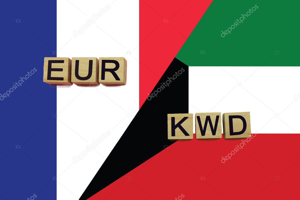 France and Kuwait currencies codes on national flags background. International money transfer concept