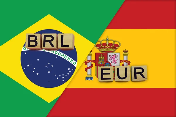 Brazil Spain Currencies Codes National Flags Background International Money Transfer — Stock Photo, Image