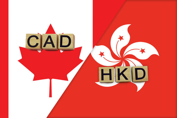 Canada and Hong Kong currencies codes on national flags background. International money transfer concept