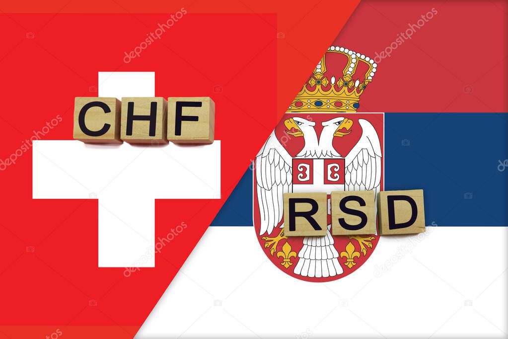 Switzerland and Serbia currencies codes on national flags background. International money transfer concept