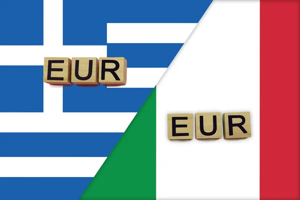 Greece and Italy currencies codes on national flags background. International money transfer concept