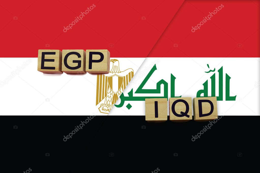 Egypt and Iraq currencies codes on national flags background. International money transfer concept