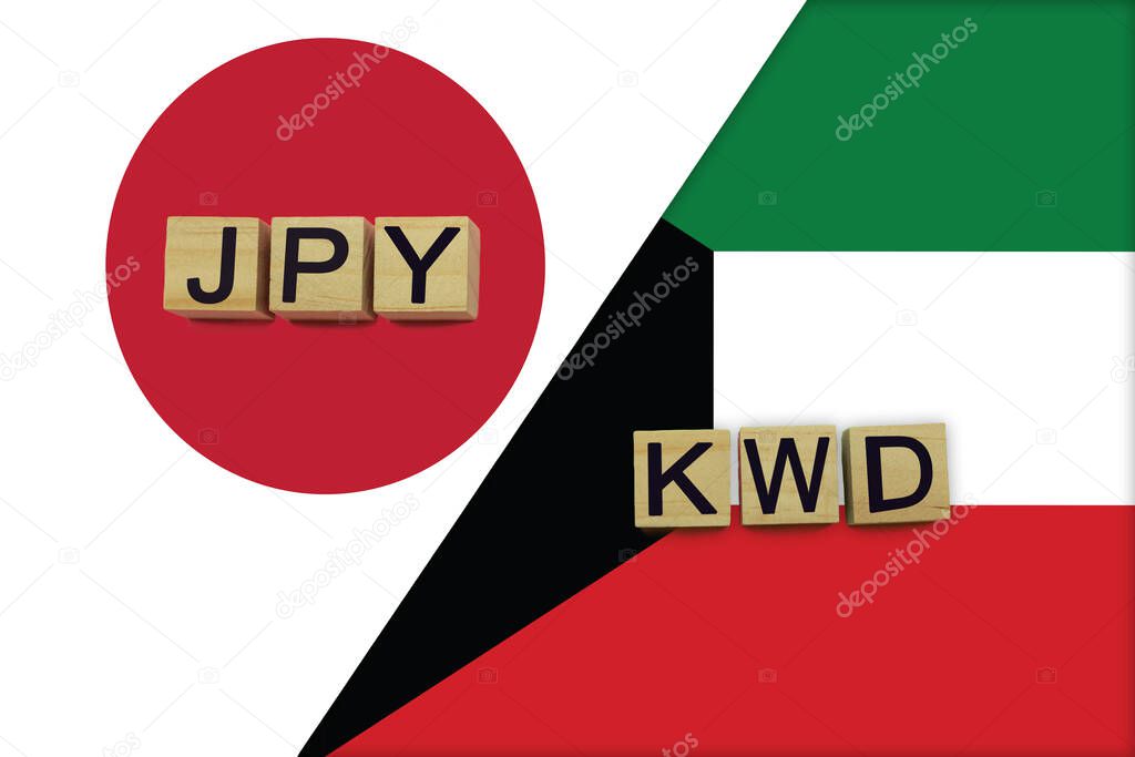 Japan and Kuwait currencies codes on national flags background. International money transfer concept