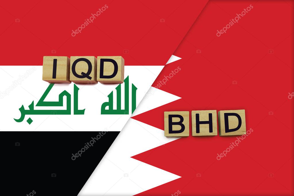Iraq and Bahrain currencies codes on national flags background. International money transfer concept