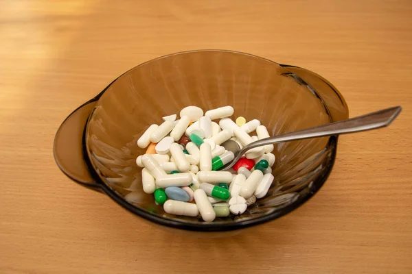 Lot Medicine Black Bowl Spoon Eating Lot Drugs Concept — Stock Photo, Image