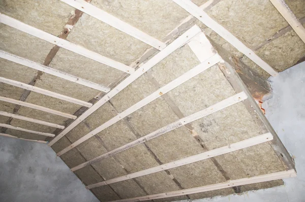 stock image Heat isolation in a new house with mineral wool and wood.