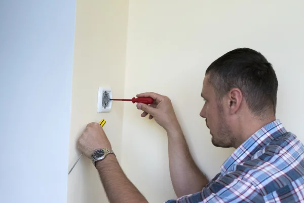 Man Installing Light Switch Home Renovation Electrician Installing Light Switch Stock Image