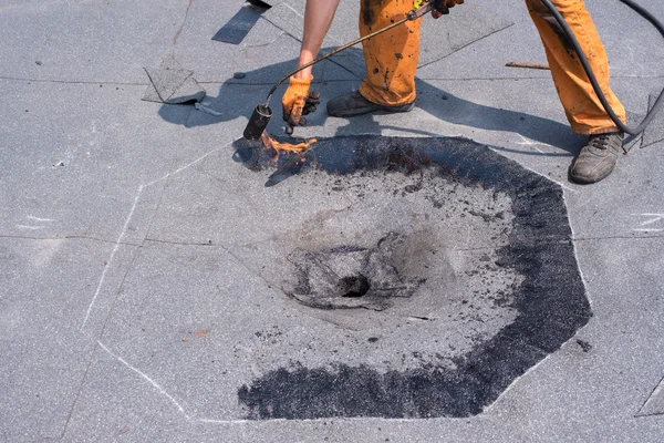 Roofer doing repair roof drain. — Stock Photo, Image