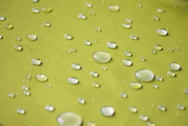 Wasserdichtes Textil mit wärmeren Tropfen — Stockfoto