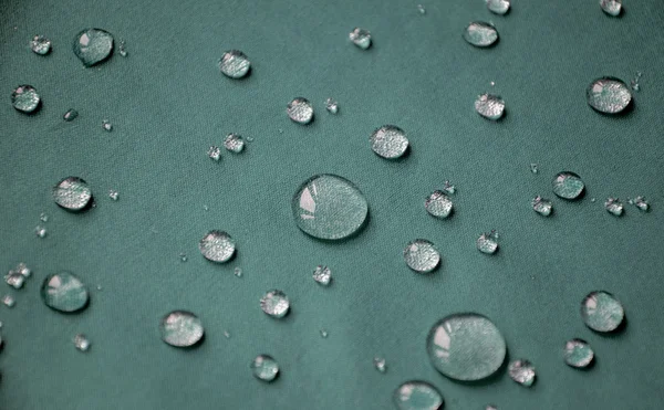 Waterproof textile with drops warter — Stock Photo, Image