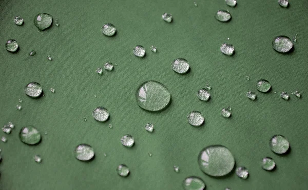 Waterdichte textiel met druppels warter — Stockfoto