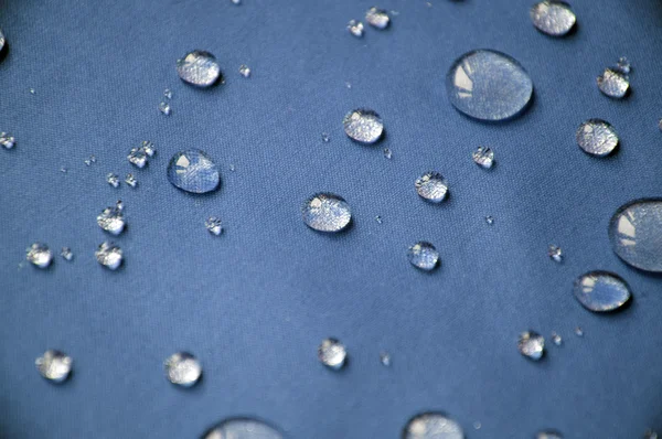 Revestimiento impermeable textil, fondo con gotas de agua . — Foto de Stock