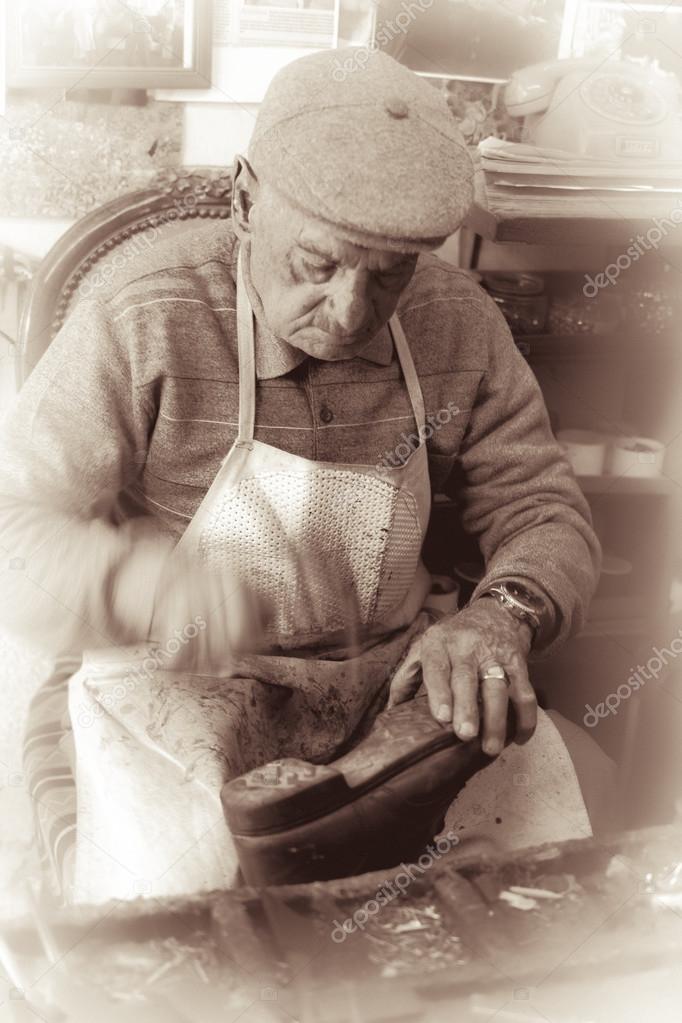 Cobbler at work using traditional tools- old Nicosia, Cyprus- Portrait