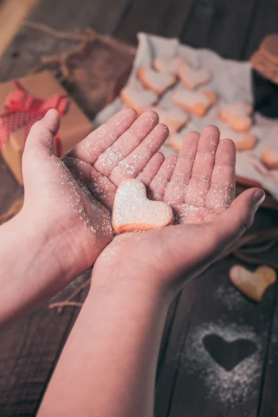 Valentine cookie heart in hand