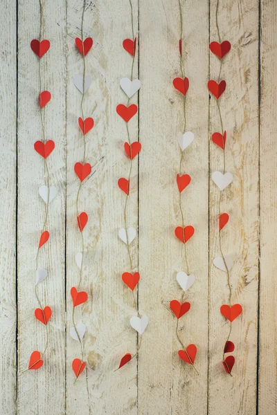 Valentines arrows on rustic wooden texture background — Stock Photo, Image