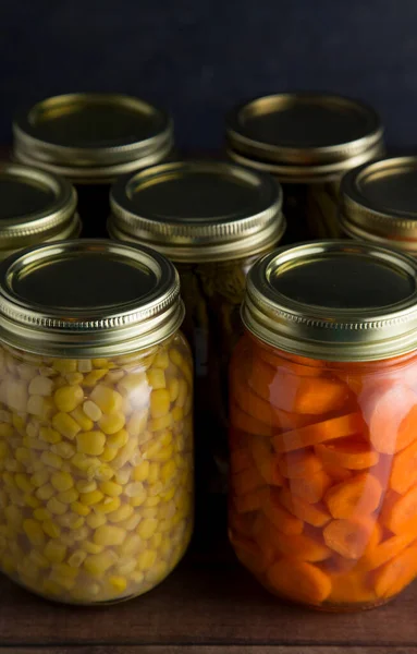 Various Types Canned Vegetables Wooden Table Dark Environment — Stock Photo, Image