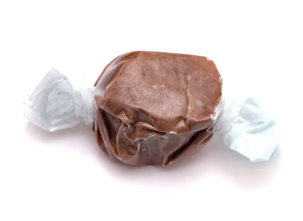 Single Piece Chocolate Salt Water Taffy White Background — Stok Foto