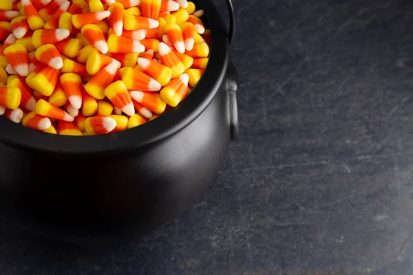 Black Cauldron Witches Filled Candy Corn — Stock Photo, Image