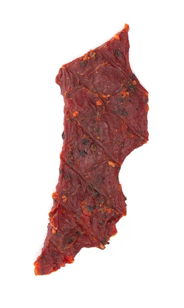 Kawałek Black Pepper Beef Jerky Białym Tle — Zdjęcie stockowe