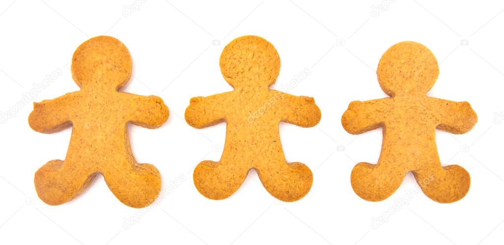 Three Undecorated Gingerbread People on a White Background