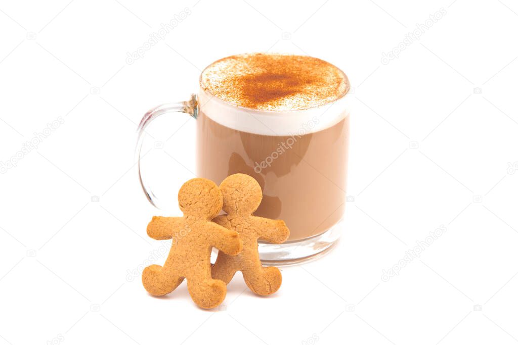 A Gingerbread Latte in a Clear Mug with Cookies on the Side