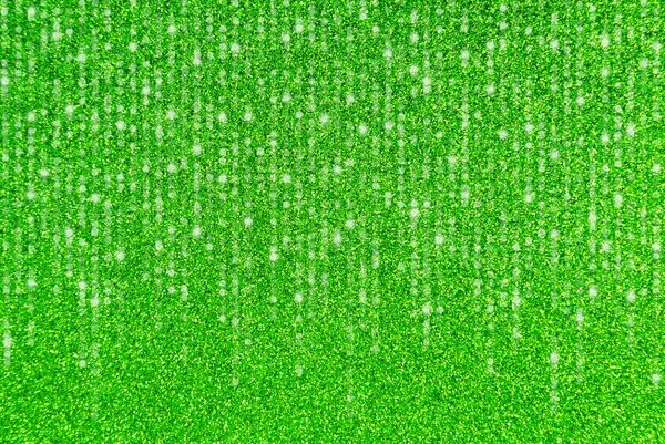 A Green Glitter Border with Cascading Lights