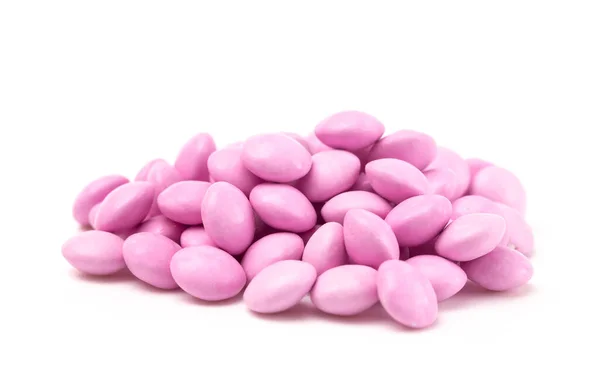 Pink Candy Coated Chocolate Gems White Background — стоковое фото