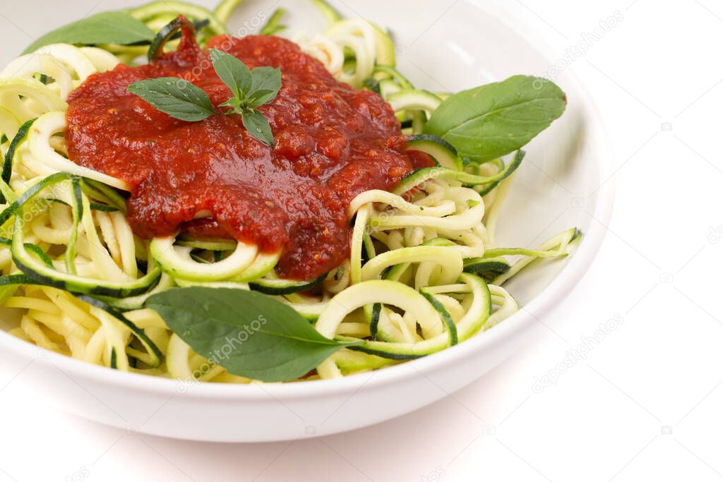Zucchini Pasta Topped with Tomato Sauce and Basil