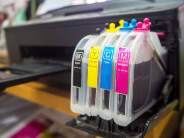 digital printing press, closeup of the toner cartridges clipart