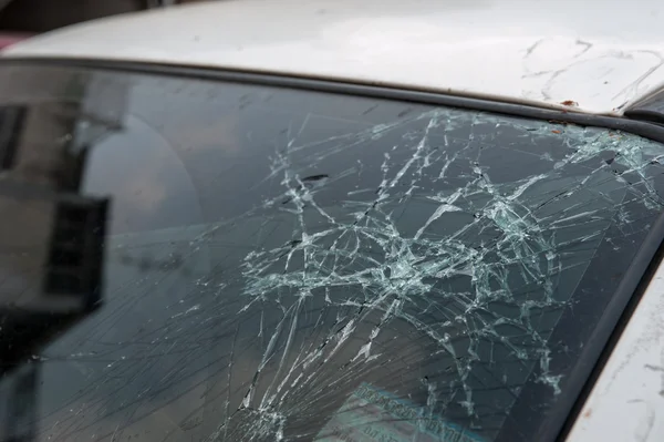 The broken windshield in car accident