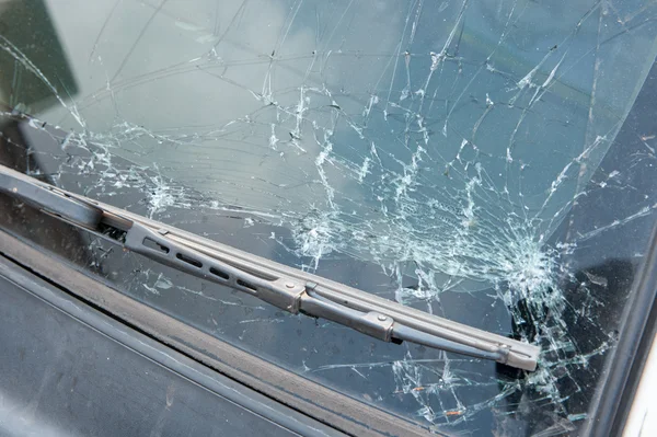 The broken windshield in car accident