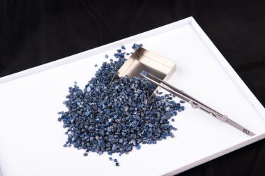Raw, uncut and rough blue Sapphire crystals. clipart