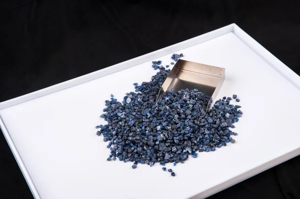 Raw, uncut and rough blue Sapphire crystals. — Stock Photo, Image