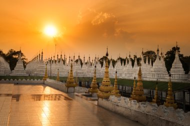 Golden pagodas is on Sagaing Hill, Myamar. View from the top of this hill. clipart