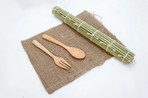 Wooden spoon on sack — Stock Photo, Image