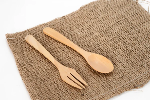 Wooden spoon on sack — Stock Photo, Image