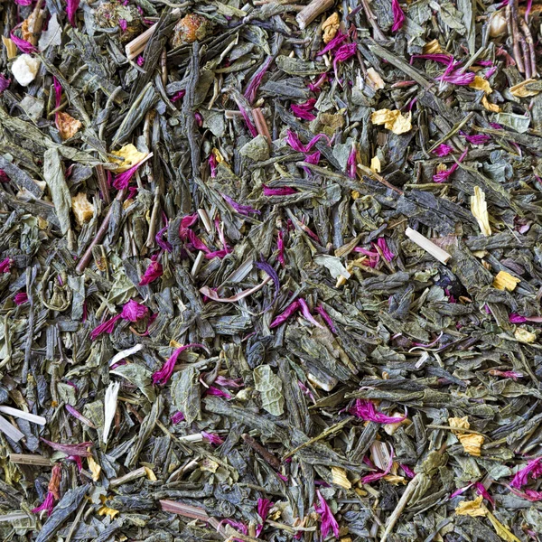 Fundo de uma mistura de chá, flores e frutas secas — Fotografia de Stock