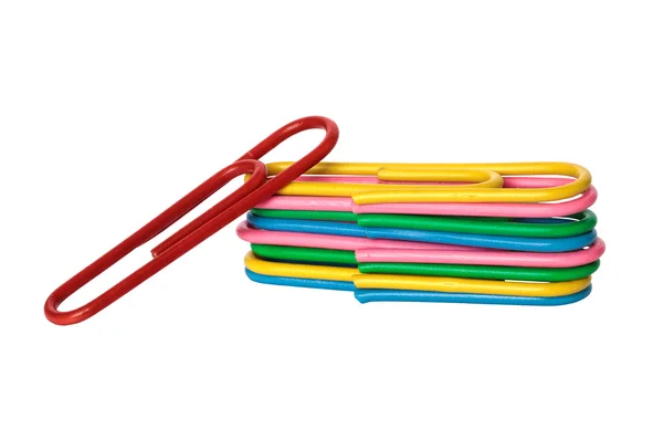 Colored paper clips on a white background — Stock Photo, Image