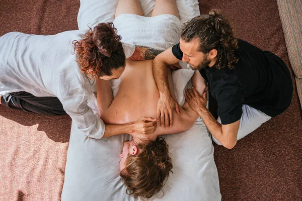 Stock Photo Relaxed Man Enjoying Back Massage While Lying Floor — Stock Photo, Image