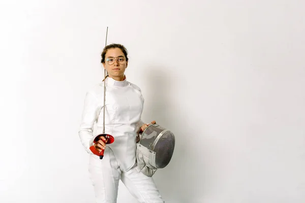 Expressive Girl Wearing Fencing Suit Holding Rapier Looking Camera White — Stock Photo, Image