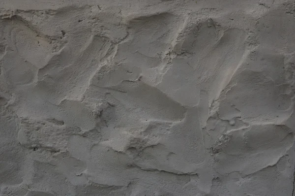 Fragment einer grauen Zementwand — Stockfoto