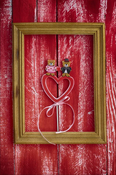 Wooden frame with carved wooden heart inside — Stock Photo, Image