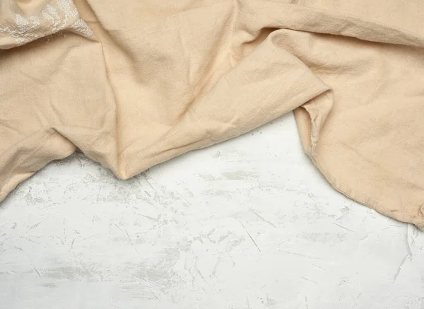 Bézs Textil Konyharuha Fehér Háttérrel Felülnézet — Stock Fotó