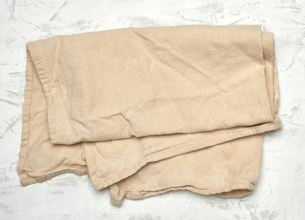 Beige Textiel Keukenhanddoek Witte Achtergrond Bovenaanzicht — Stockfoto