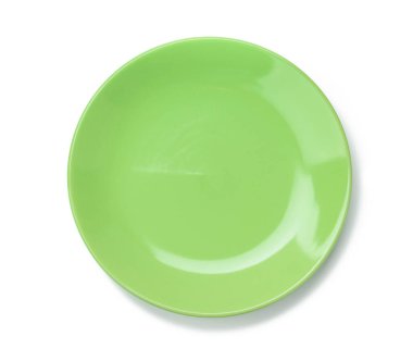 Beyaz arkaplanda izole edilmiş ana yemekler için boş yuvarlak yeşil tabak, üst görünüm