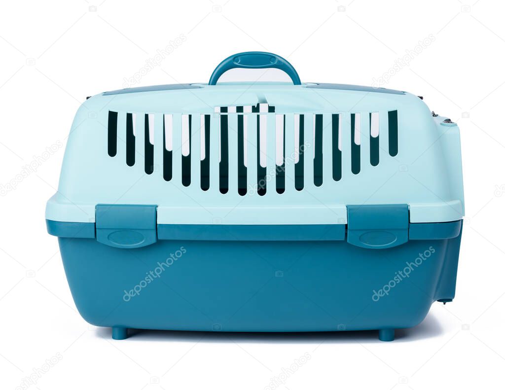 large plastic carrier cage for cats and dogs on white background
