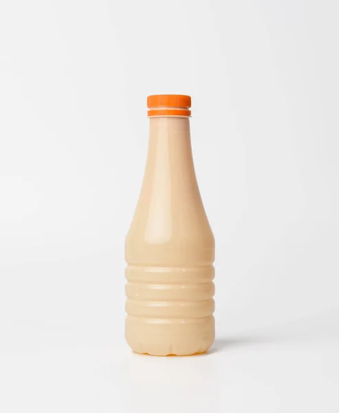 Beige Plastikflasche Für Milch Auf Weißem Hintergrund Behälter Für Flüssige — Stockfoto