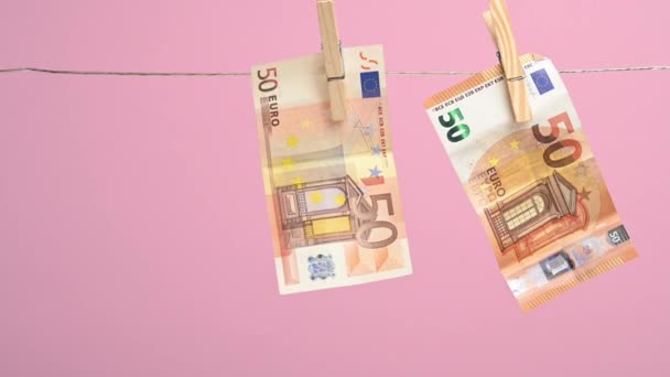 Cuelga Tendedero Papel Moneda Unión Europea Euros Fondo Rosa Concepto — Vídeos de Stock
